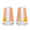 Back view of the 'Pyramids' high-top sneaker by Tamalpais, featuring a soft peach background and abstract yellow mountain shapes.