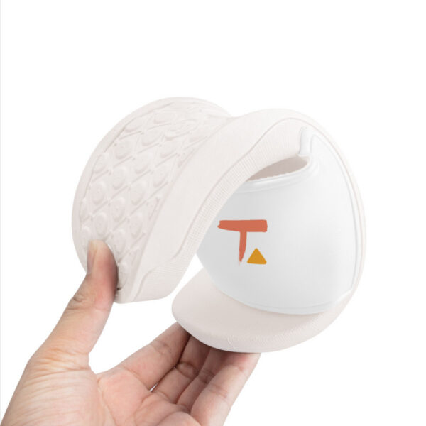 Flexible sole demonstration of the Tamalpais slides being bent to showcase comfort and durability.