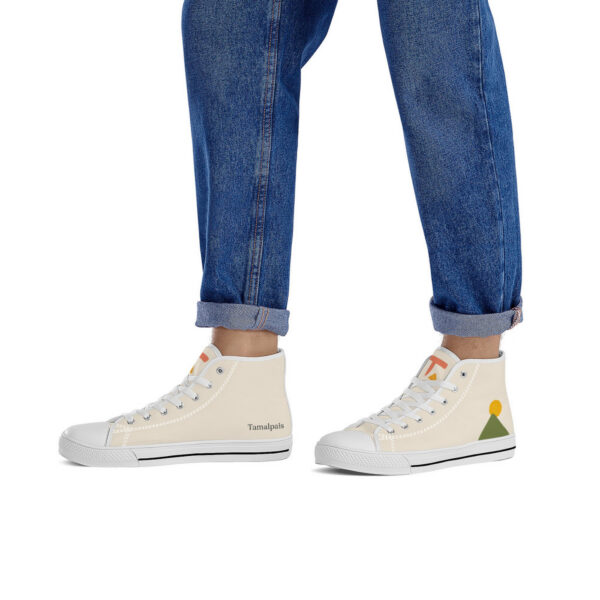 Person wearing “Zénith” Tamalpais sneakers with rolled-up jeans, showcasing the design on both sides.