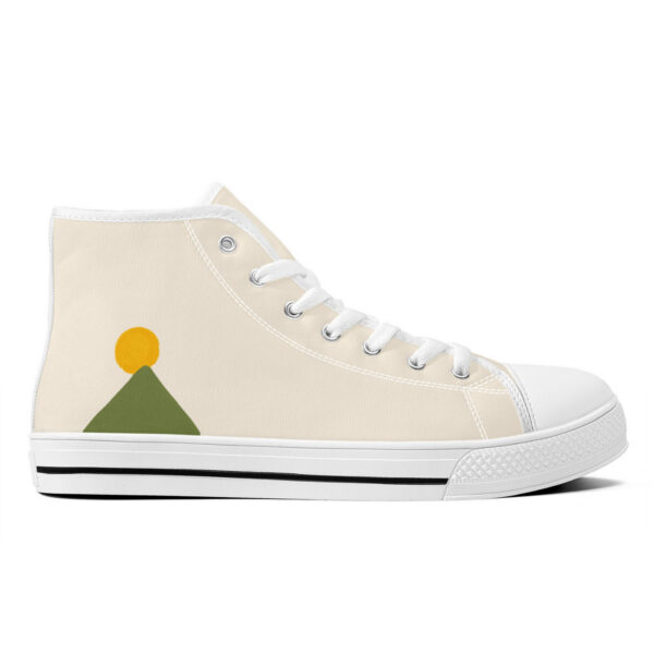 Right outside of the “Zénith” sneakers showing the abstract sunrise over the mountain.