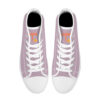 Top-down view of the Watercourse sneakers, showcasing the white laces and the bold orange Tamalpais 'T' logo on the tongue.