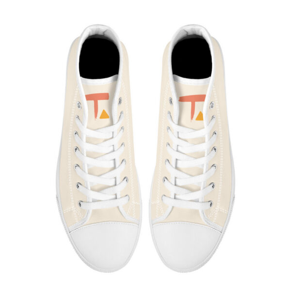 Top view of Tamalpais “Zénith” sneakers, cream canvas with orange T logo and triangle, white laces.