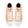 Top view of the 'Pyramids' sneaker, revealing the white laces and tongue print with the orange 'T' and yellow triangle logo.