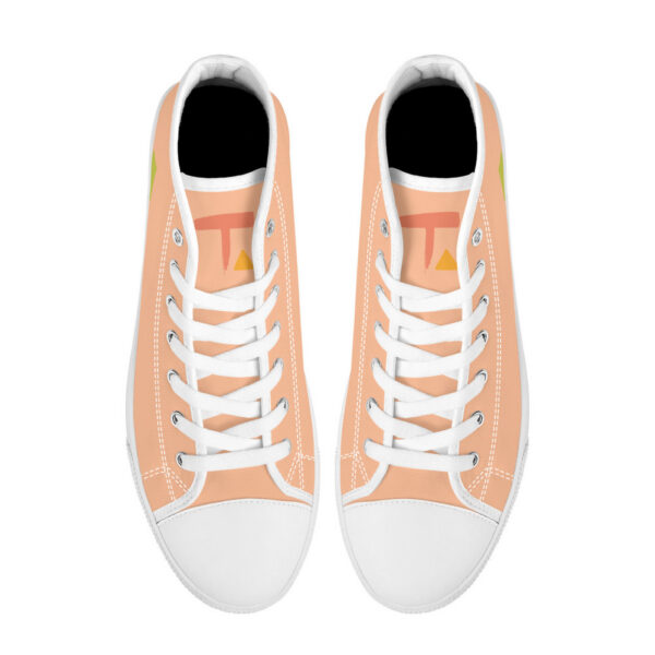 Top view of the 'Pyramids' sneaker, revealing the white laces and tongue print with the orange 'T' and yellow triangle logo.